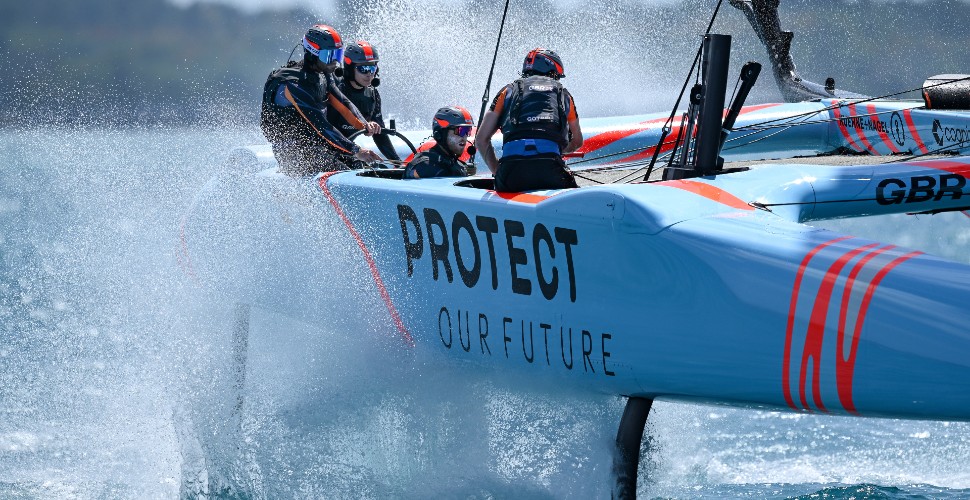 Great Britain SailGP F50 catamaran flying across the water